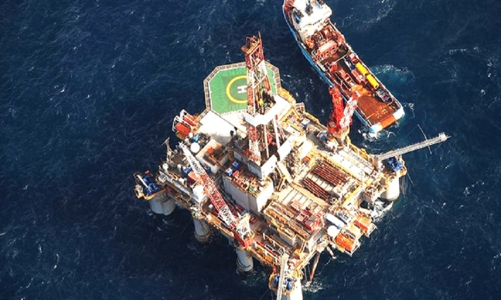Ocean Guardian oil rig with supply vessel, offshore Falklands, 2010 exploration campaign